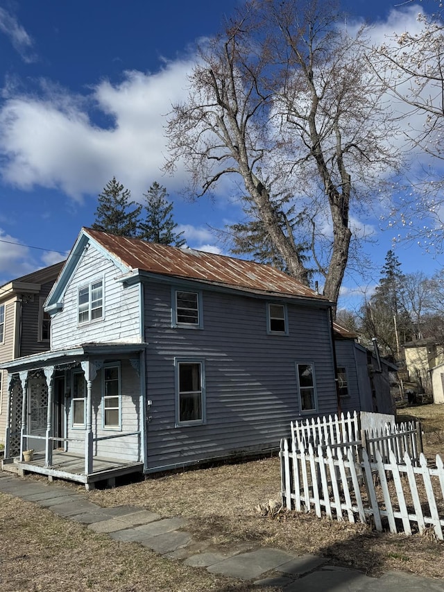 10 N Franklin St, Athens, NY 12015 - exterior space featuring metal roof, covered porch, and fence