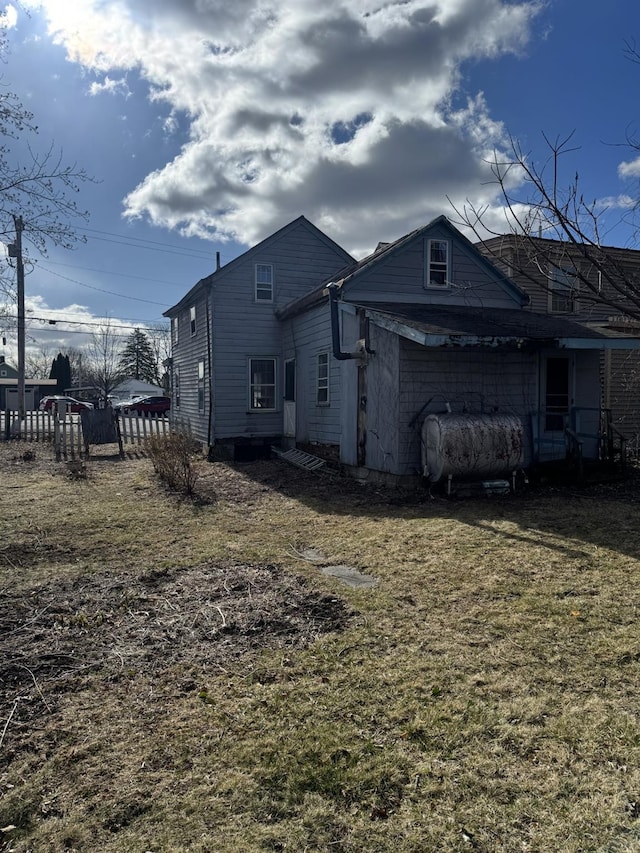 10 N Franklin St, Athens, NY 12015 - exterior space featuring a lawn, heating fuel, and fence