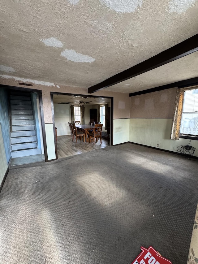 10 N Franklin St, Athens, NY 12015 - interior space featuring carpet flooring, visible vents, stairs, and a textured ceiling