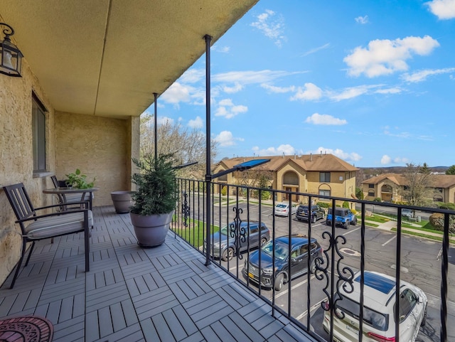 balcony featuring a residential view