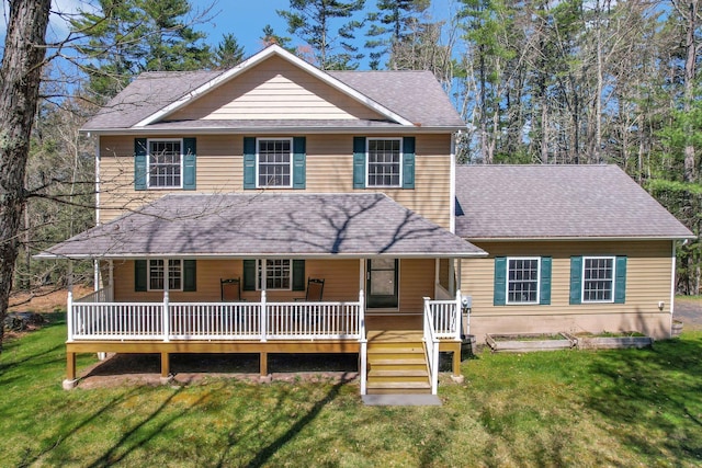 25 Devlin Rd, Eldred, NY 12743 - view of front of home with covered porch, a front yard, and roof with shingles