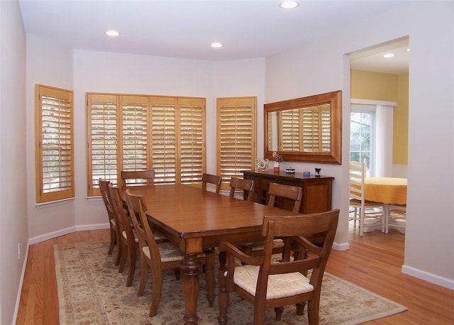 11 Arielle Ct, Islandia, NY 11749 - dining room with recessed lighting, wood finished floors, and baseboards