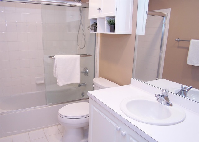11 Arielle Ct, Islandia, NY 11749 - bathroom with tile patterned flooring, vanity, toilet, and enclosed tub / shower combo