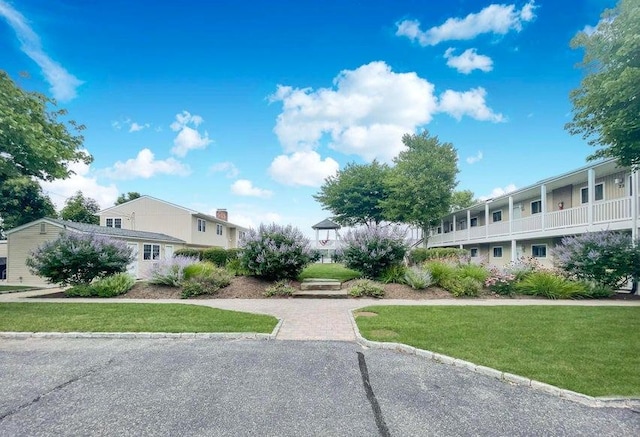 61 W Tiana Rd Unit 3, Hampton Bays, NY 11946 - view of property's community featuring a yard
