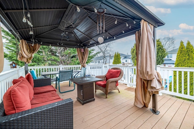 wooden terrace with a gazebo