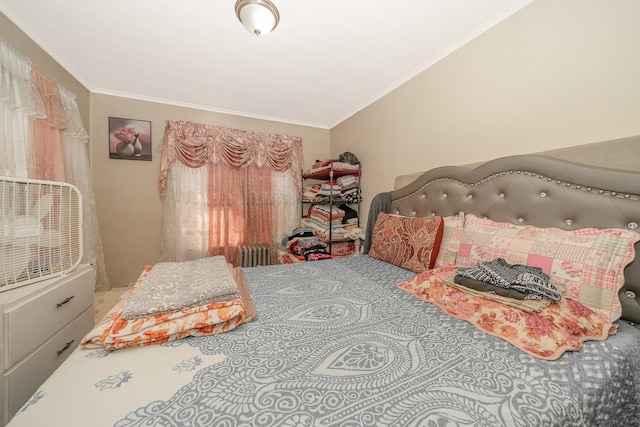 bedroom featuring radiator and ornamental molding