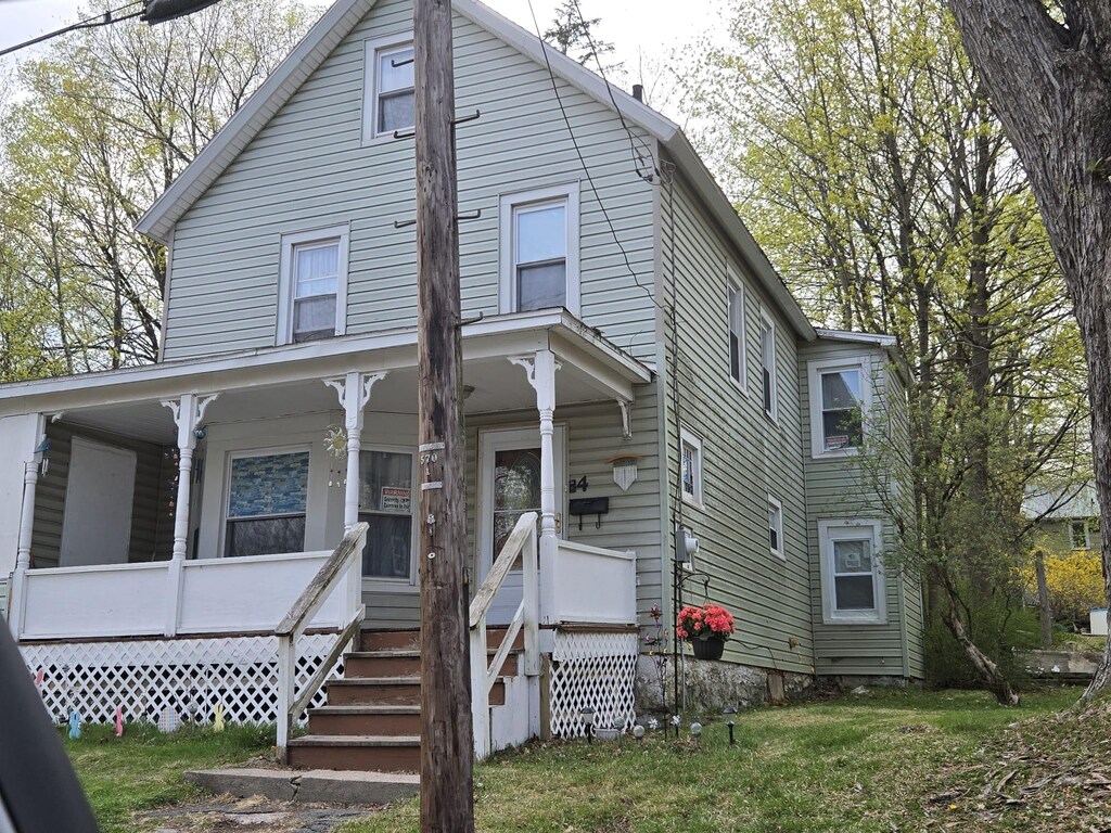 4 Ann St, Monticello, NY 12701 - view of front of house with a porch