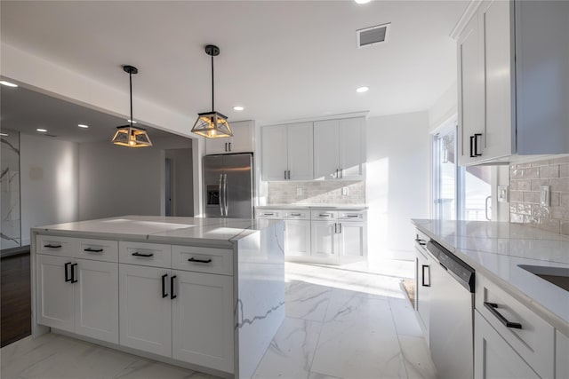 kitchen featuring marble finish floor, visible vents, recessed lighting, and appliances with stainless steel finishes