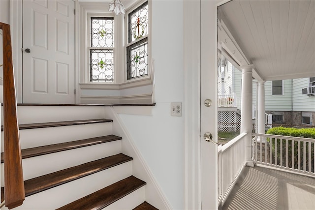 staircase featuring a healthy amount of sunlight