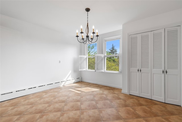 unfurnished dining area with light tile patterned flooring, a baseboard heating unit, and an inviting chandelier