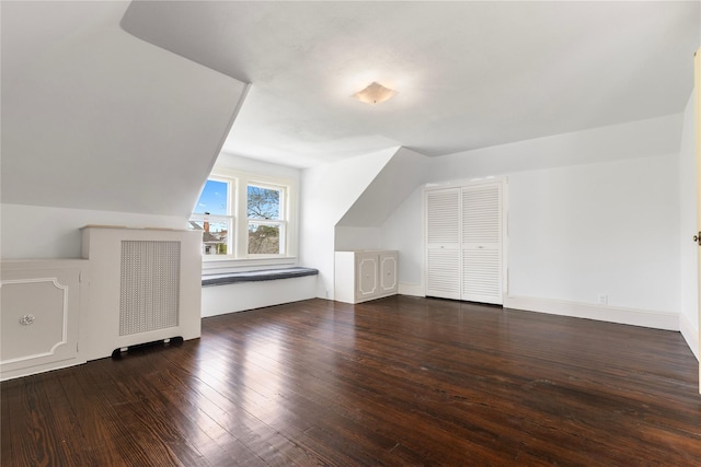 bonus room with hardwood / wood-style flooring