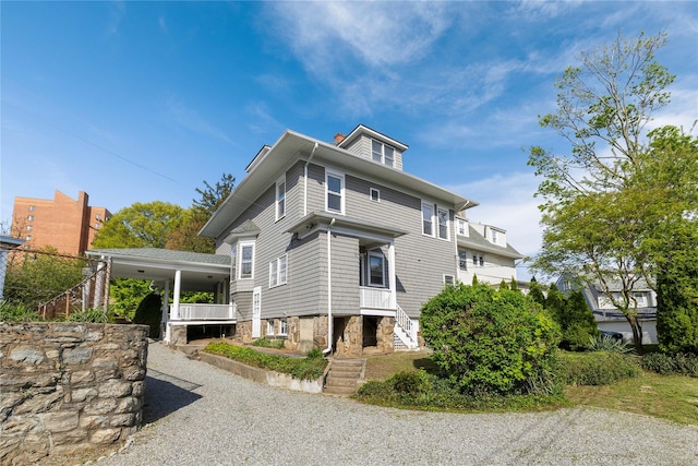view of front of property featuring stairs