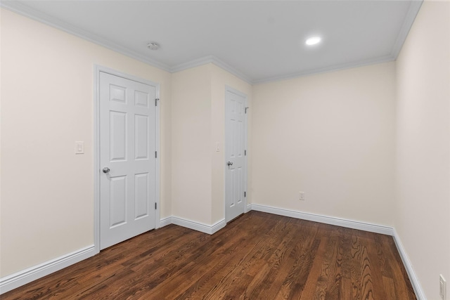 129 Parkside Dr, Suffern, NY 10901 - empty room with dark wood finished floors, baseboards, crown molding, and a smoke detector