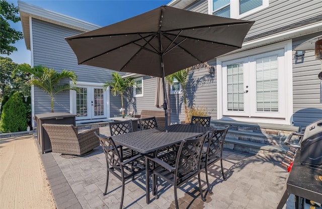 645 Hawkins Blvd, Copiague, NY 11726 - view of patio with outdoor dining space and french doors