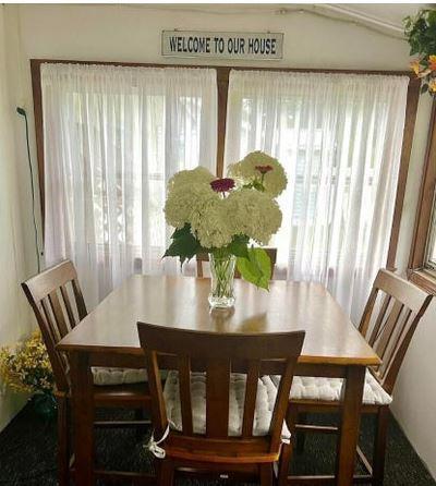12 Bluebird Dr, Lake Luzerne, NY 12846 - dining area with vaulted ceiling
