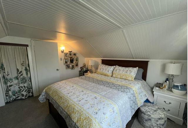 12 Bluebird Dr, Lake Luzerne, NY 12846 - carpeted bedroom with lofted ceiling