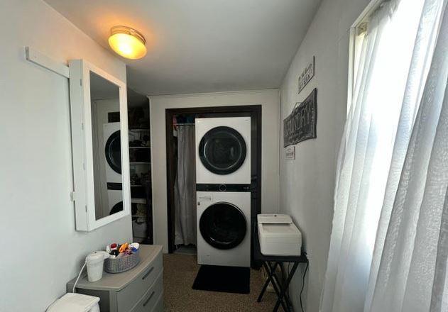 12 Bluebird Dr, Lake Luzerne, NY 12846 - washroom with stacked washer and clothes dryer