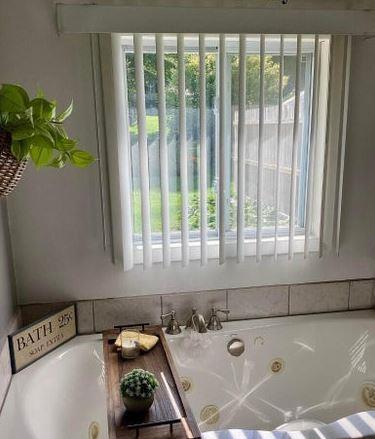 12 Bluebird Dr, Lake Luzerne, NY 12846 - bathroom view of a jetted tub