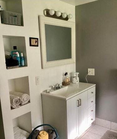 12 Bluebird Dr, Lake Luzerne, NY 12846 - bathroom featuring vanity and tile patterned floors