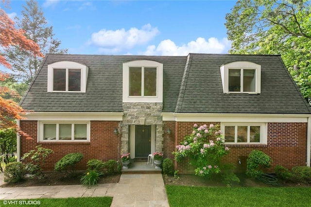30 Appleton Pl, Dobbs Ferry, NY 10522 - view of front property featuring a shingled roof, stone siding, and brick siding