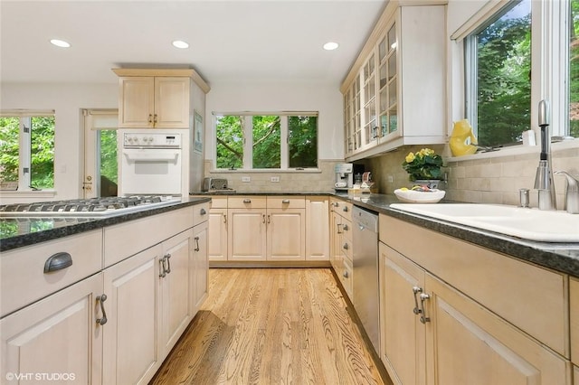 30 Appleton Pl, Dobbs Ferry, NY 10522 - kitchen featuring appliances with stainless steel finishes, a sink, light brown cabinetry, light wood-style floors, and recessed lighting