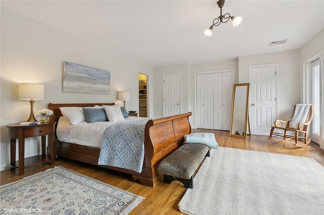 30 Appleton Pl, Dobbs Ferry, NY 10522 - bedroom featuring two closets, wood finished floors, and baseboards