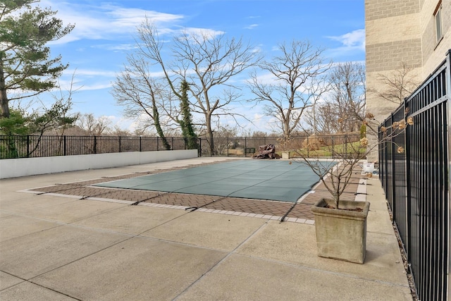 view of pool featuring fence, a patio area, and a fenced in pool