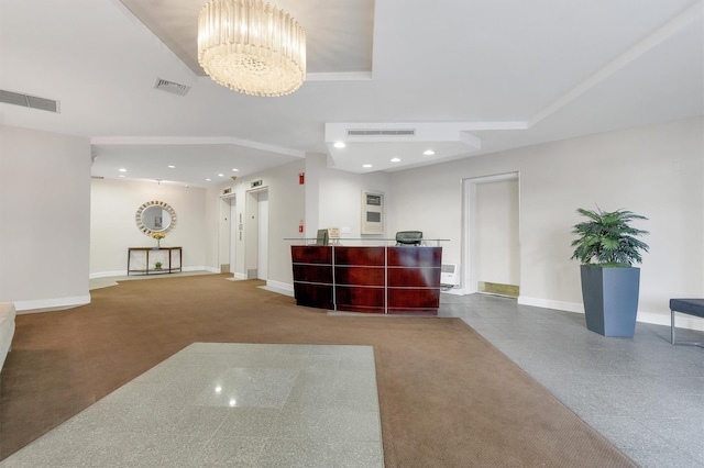 reception featuring visible vents and an inviting chandelier