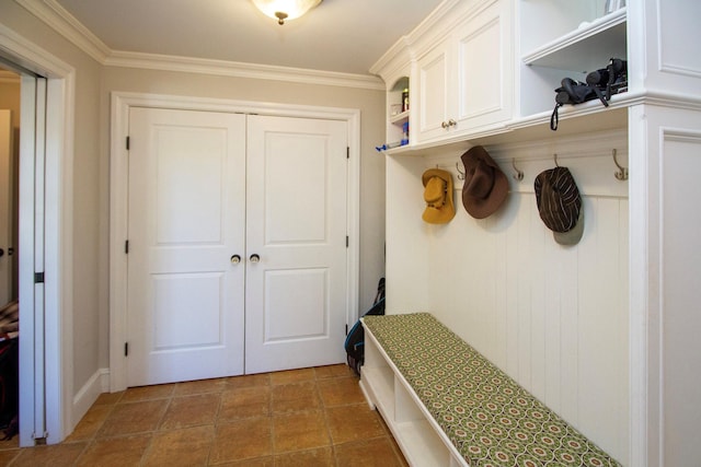 31 Paquatuck Ave, East Moriches, NY 11940 - mudroom with tile patterned floors and ornamental molding