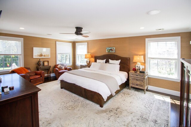 31 Paquatuck Ave, East Moriches, NY 11940 - bedroom with baseboards, ornamental molding, and multiple windows