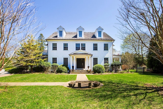 31 Paquatuck Ave, East Moriches, NY 11940 - colonial inspired home with a front lawn