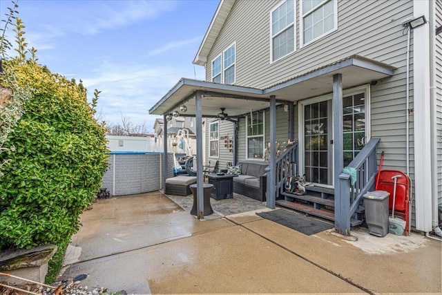 view of patio / terrace with ceiling fan and entry steps