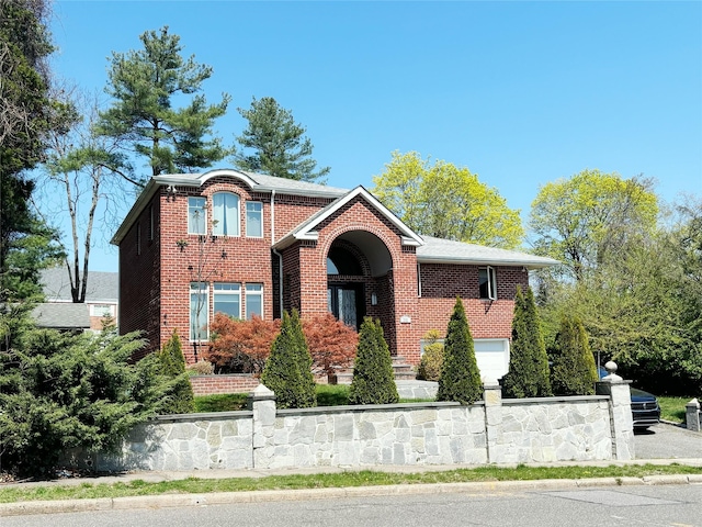 300 Ellen Pl, Oyster Bay, NY 11753 - view of front of property with brick siding and a garage