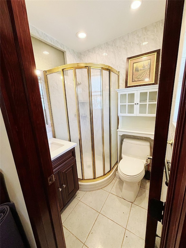 300 Ellen Pl, Oyster Bay, NY 11753 - bathroom with a shower stall, vanity, tile patterned floors, toilet, and recessed lighting
