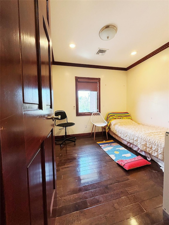 300 Ellen Pl, Oyster Bay, NY 11753 - unfurnished bedroom featuring crown molding, baseboards, visible vents, and hardwood / wood-style floors