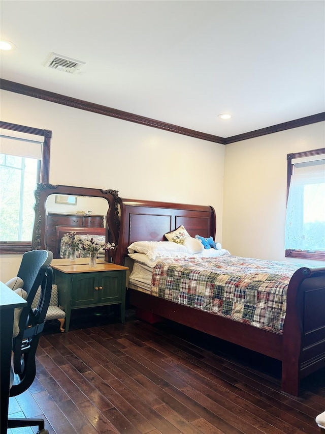 300 Ellen Pl, Oyster Bay, NY 11753 - bedroom with visible vents, ornamental molding, wood-type flooring, and multiple windows