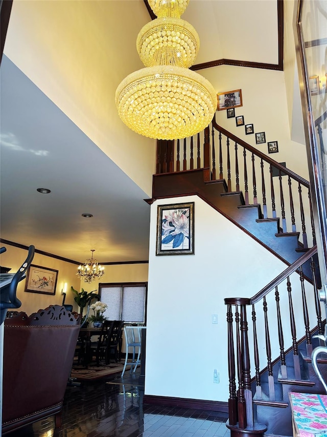 300 Ellen Pl, Oyster Bay, NY 11753 - staircase featuring an inviting chandelier, baseboards, and wood finished floors