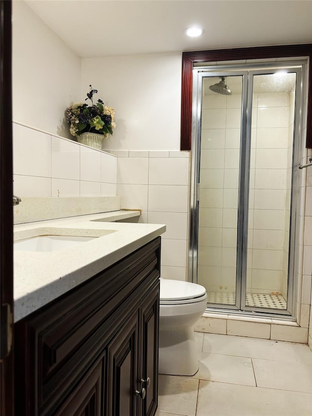 300 Ellen Pl, Oyster Bay, NY 11753 - bathroom with vanity, tile patterned flooring, a shower stall, and tile walls