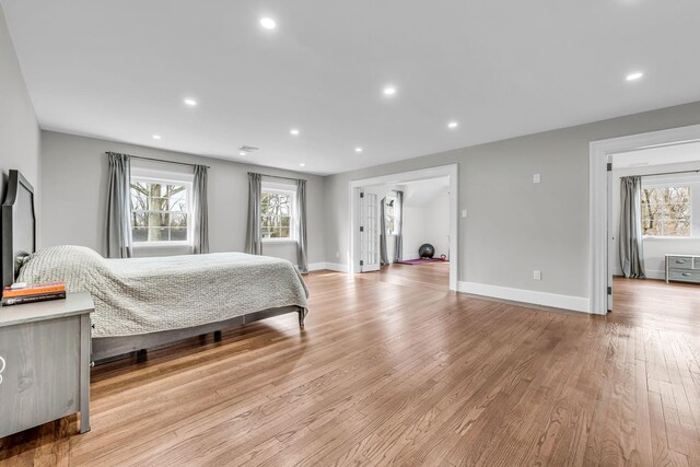 28 Northfield Rd, Glen Cove, NY 11542 - bedroom featuring baseboards, light wood finished floors, and recessed lighting