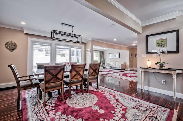 63 Bucket Ln, Levittown, NY 11756 - dining space featuring wood finished floors, baseboards, and ornamental molding