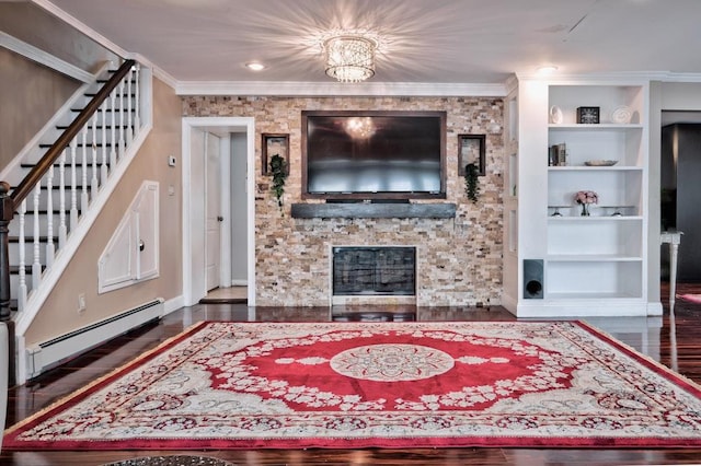 63 Bucket Ln, Levittown, NY 11756 - living area with a baseboard radiator, stairs, built in shelves, baseboards, and ornamental molding