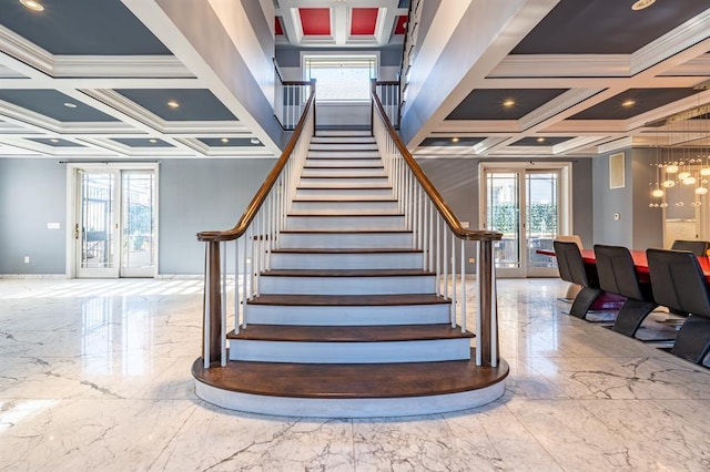 stairway featuring marble finish floor, baseboards, crown molding, and coffered ceiling