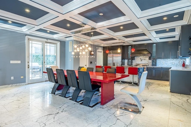 dining space featuring marble finish floor, baseboards, coffered ceiling, and ornamental molding