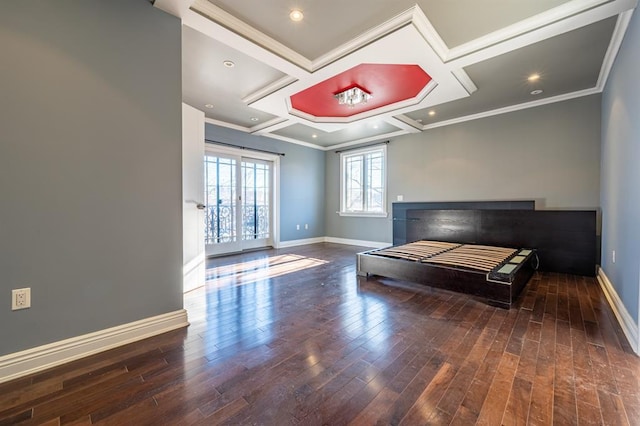 bedroom with baseboards, ornamental molding, wood finished floors, recessed lighting, and coffered ceiling