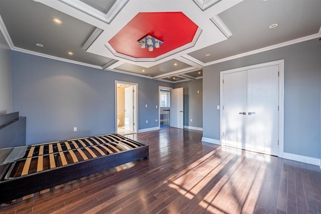 unfurnished bedroom with coffered ceiling, baseboards, and ornamental molding