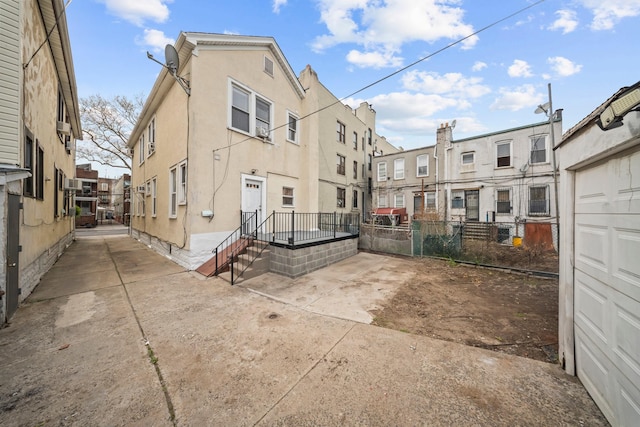 87 E 32nd St, Brooklyn, NY 11226 - exterior space with fence, a residential view, and stucco siding