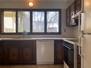 29 S Plank Rd, Westtown, NY 10998 - kitchen with light countertops, white appliances, a wealth of natural light, and a sink
