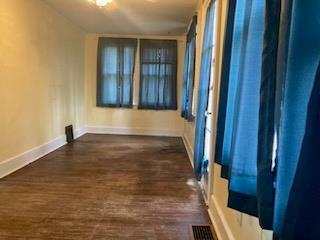 29 S Plank Rd, Westtown, NY 10998 - empty room featuring visible vents, baseboards, and dark wood-type flooring