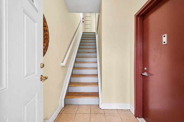 338 Hendrix St, Brooklyn, NY 11207 - stairway with tile patterned flooring and baseboards
