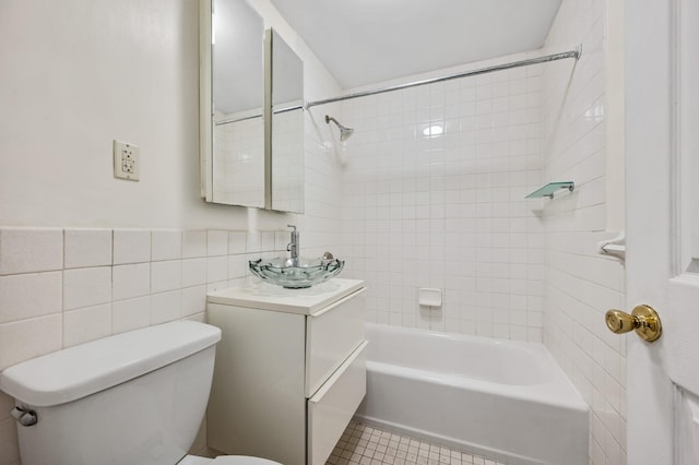 338 Hendrix St, Brooklyn, NY 11207 - full bathroom featuring toilet, tile walls, shower / bathing tub combination, tile patterned flooring, and vanity